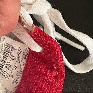 Vibrant Red and White Athletic Shoes